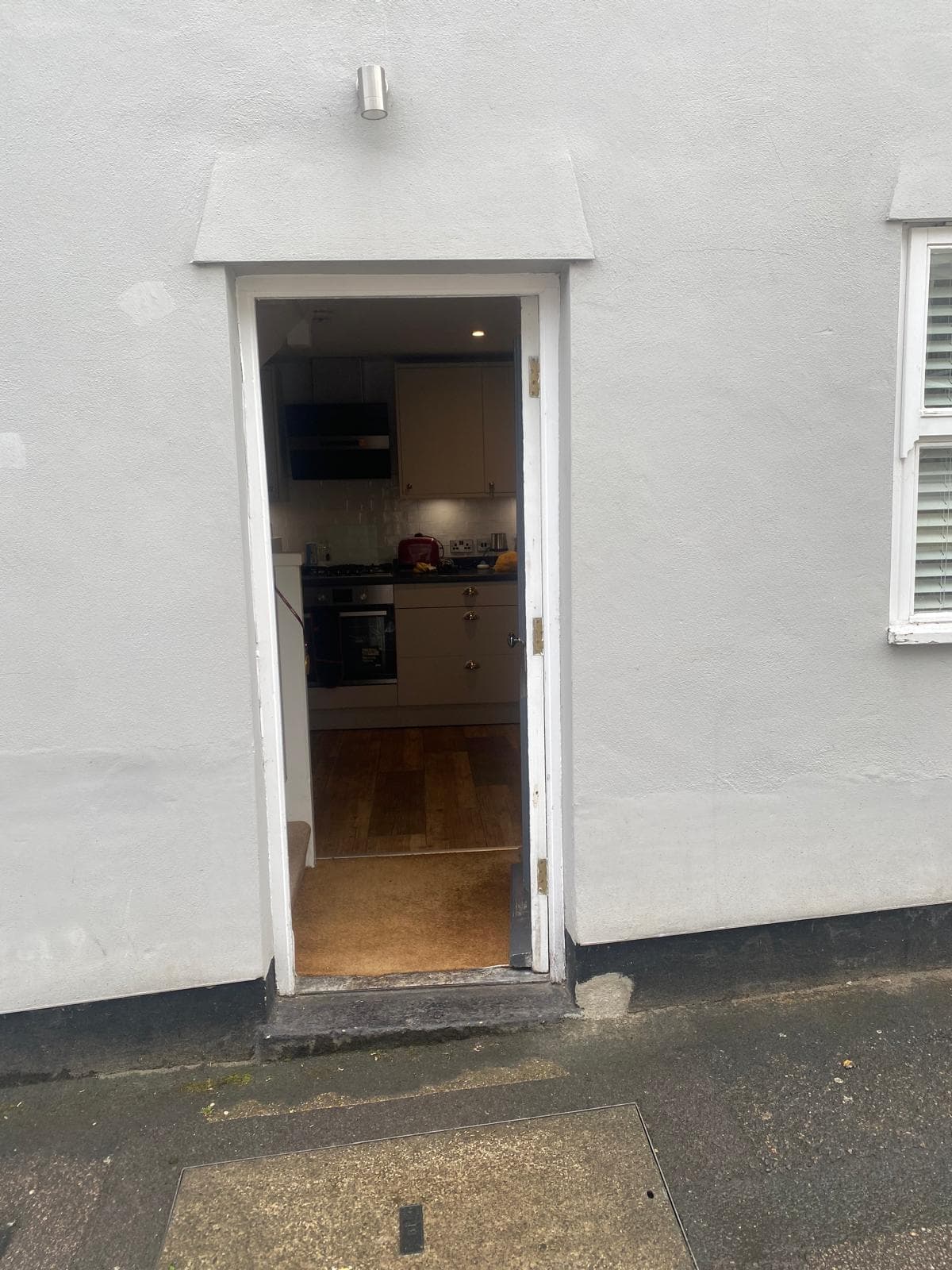 Narrow exterior doorway the stump grinder was manoeuvred through to reach the garden